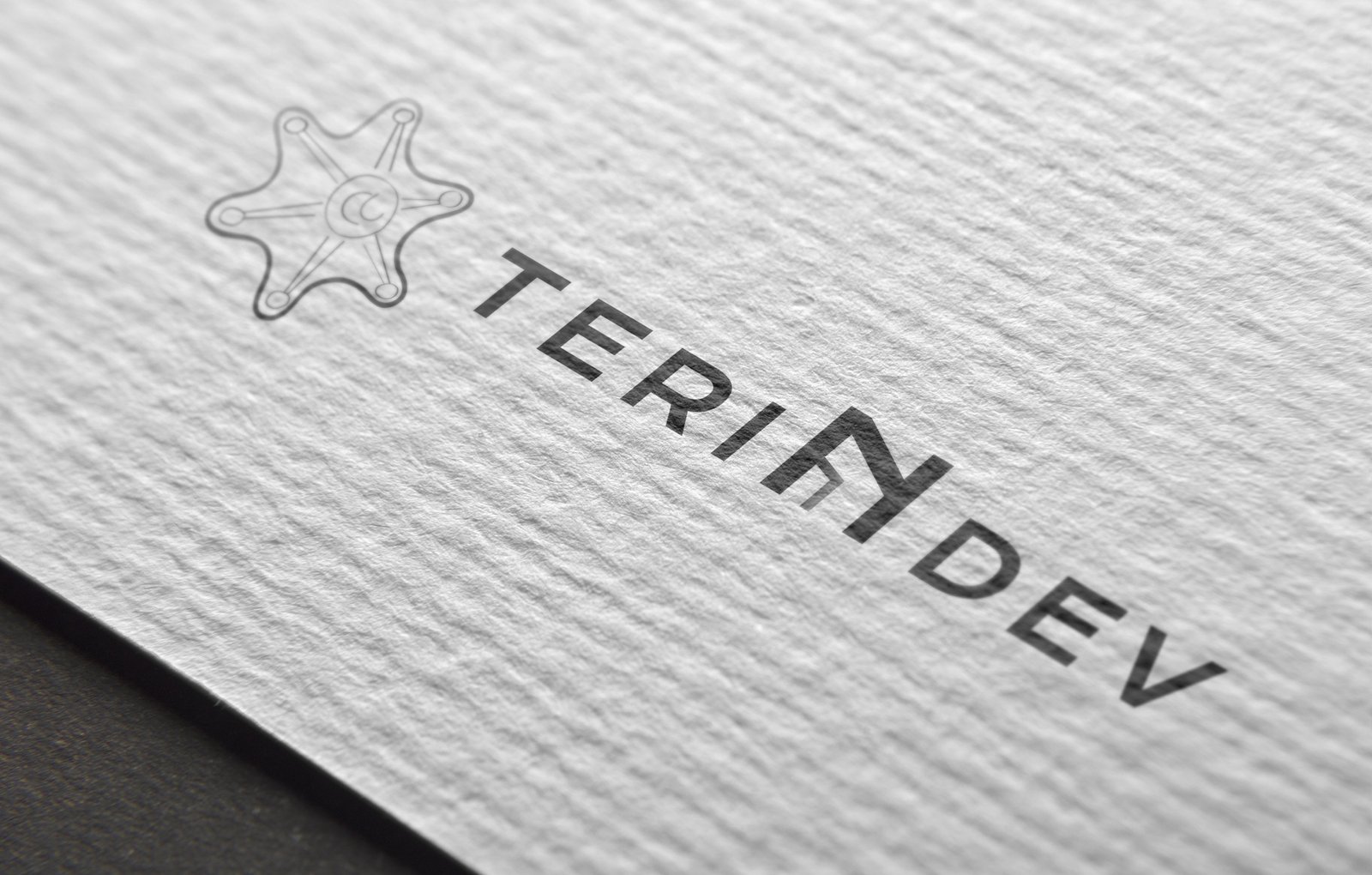 Logo Noir et Blanc sur papier relief